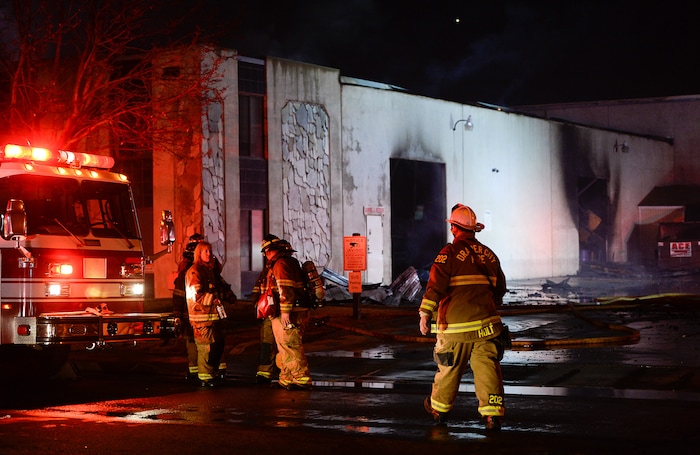 (Francisco Kjolseth | The Salt Lake Tribune) Crews from multiple agencies battled a fire Sunday night that broke out at South Valley Specialties at 9320 S. 547 West in Sandy. The building, where the company makes custom rubber moldings and other products, was declared a complete loss. The cause of the blaze is under investigation.
