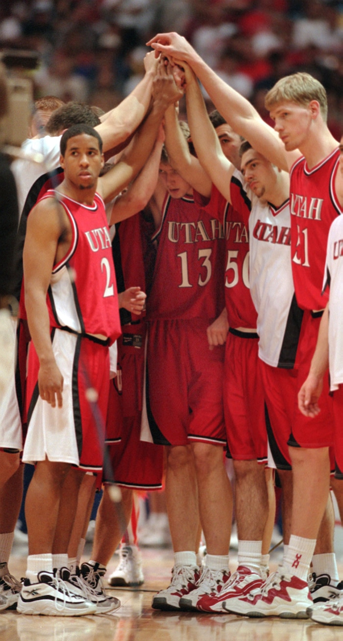 (Steve Griffin  |  Tribune file photo)  The Utes met at center court before the start of their 1998 Final Four game against North Carolina at the Alamodome in San Antonio, Texas.