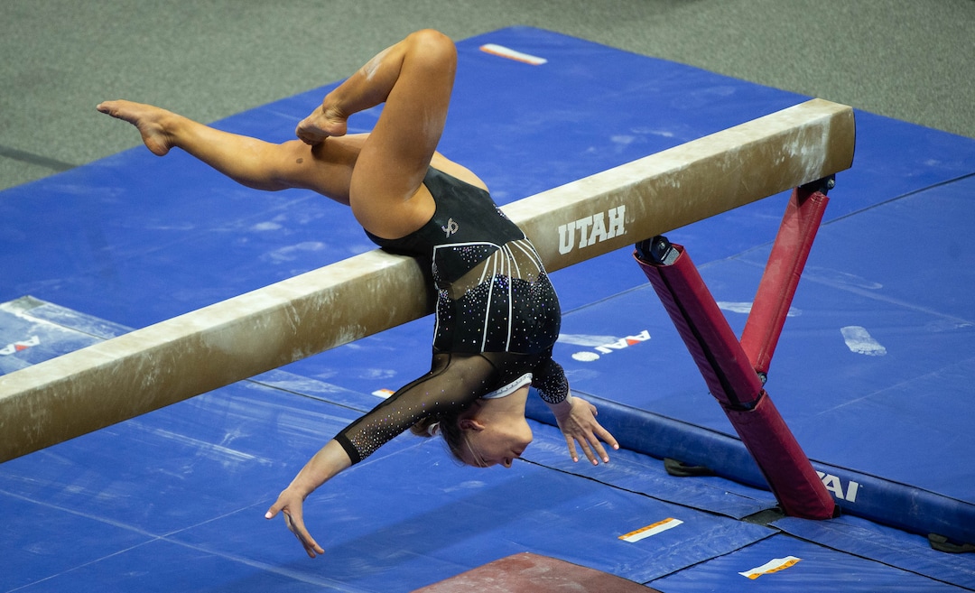 (Francisco Kjolseth  | The Salt Lake Tribune) Maile O’Keefe performs on the balance beam in PAC-12 gymnastics action Utah vs UCLA, at the Huntsman Center on Friday, Feb. 19, 2021.