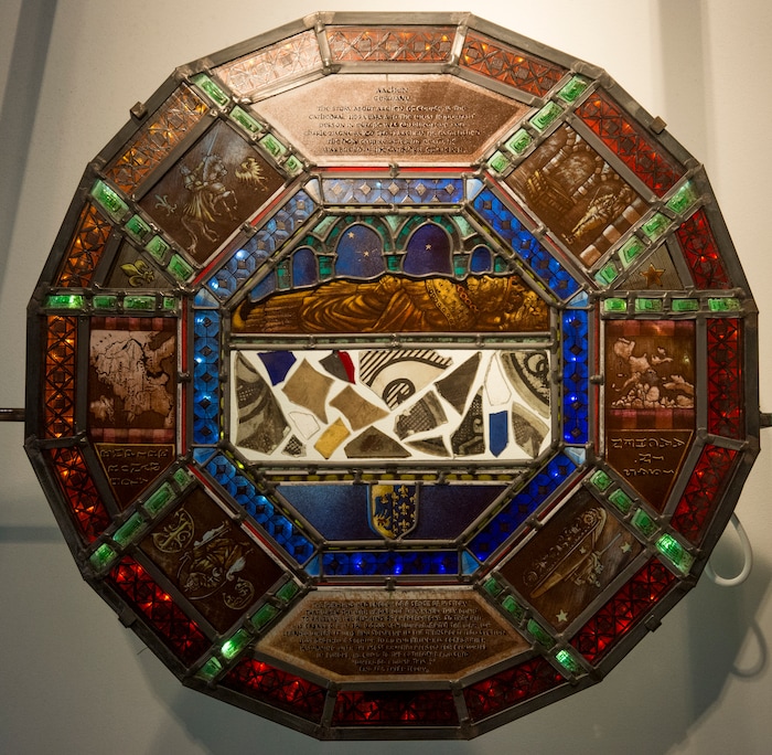 (Rick Egan  |  The Salt Lake Tribune)      Cathedral of Aachen, Aachen, Germany, is part of the The McDonald Windows, stained glass exhibit, "Remembered Light," which features fragments from World War II windows. The exhibit brought to Utah by the Salt Lake Interfaith Roundtable & the Peace Committee of the Utah District of Rotary International. The exhibit runs through Nov 17, at 175 South Main, in Salt Lake City.  Monday, Oct. 29, 2018.


