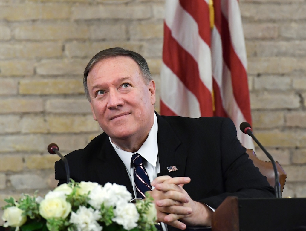 (Andreas Solaro | AP) U.S. Secretary of State Mike Pompeo attends a Vatican U.S. Symposium on Faith-Based Organizations at the Vatican, Wednesday, Oct. 2, 2019. U.S. Secretary of State Mike Pompeo on Wednesday criticized governments that wield absolute power as threats to religious freedom, as he scrambled to contain a political crisis back home.