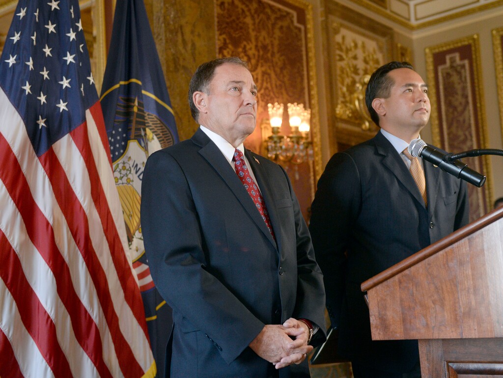 (Al Hartmann  |  Tribune file photo)
Utah Gov. Gary Herbert, left, and Attorney General Sean Reyes speak at press conference at the state Capitol, Oct. 6, 2014.