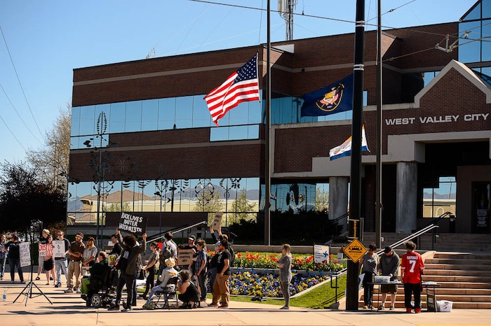 (Trent Nelson | The Salt Lake Tribune)
Utah Against Police Brutality holds a rally in front of West Valley City Hall, Saturday April 21, 2018. Elijah Smith was killed by West Valley Police on April 8 after he ran from them into a home. They shot him in the home's garage, while one hand was in the air and the other, activists say, appeared to be coming up, too. After body camera footage was released, the group began to call for the officer's firing.