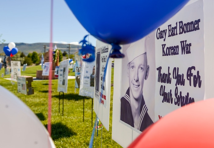 (Leah Hogsten  |  The Salt Lake Tribune) Handmade signs pay tribune to veterans at the Heber City 2020 Memorial Day Drive By Tribute to remember and honor all of our military, past and present, men and women who serve or have served in our Armed Forces, May 25, 2020.