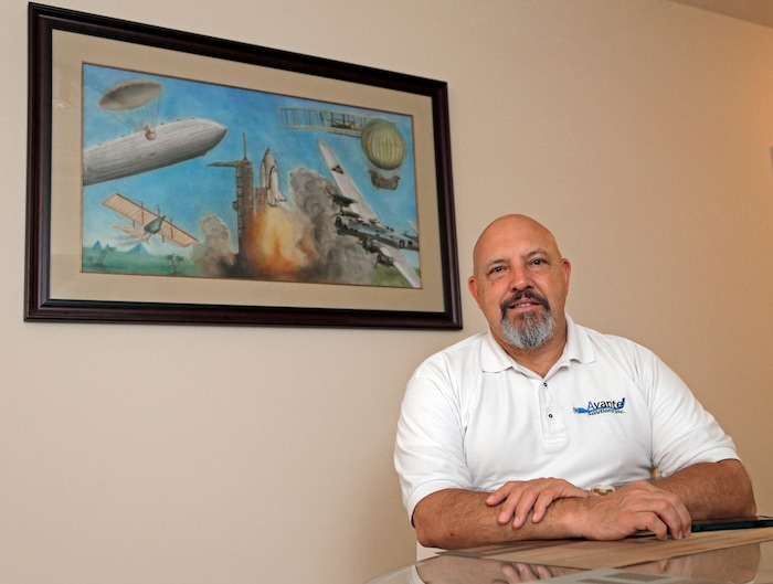 Former Word of Faith Fellowship church member Rick Cooper poses for a photo at his home in Charlotte, N.C., Monday, Sept. 18, 2017. He and 10 other members of the evangelical North Carolina-based church say their leader, Jane Whaley, coerced congregants into filing false unemployment claims after the faltering economy threatened weekly tithes from church-affiliated companies. “I was making about $700 a week, but I only collected $235 a week in unemployment,” Cooper said. “So I’m working the same hours _ many times, much longer hours _ for less. It was devastating for my family.” (AP Photo/Chuck Burton)