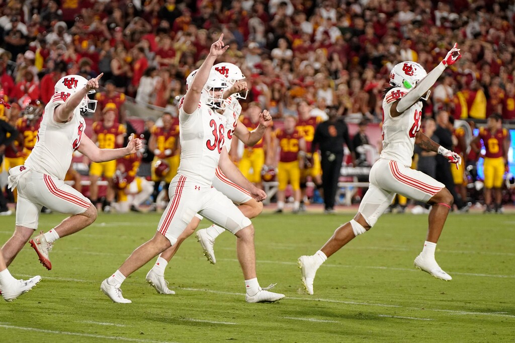 (Mark J. Terrill | AP)  Utah place kicker Cole Becker, second from left, celebrates his game-wining field goal with teammates during the second half of an NCAA college football game against Southern California Saturday, Oct. 21, 2023, in Los Angeles.