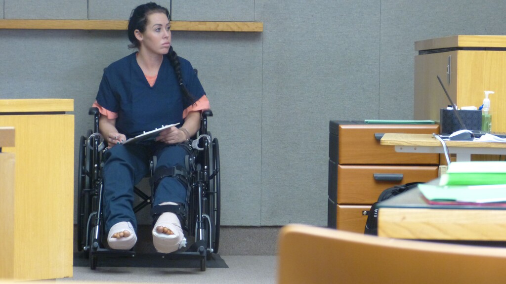 Grace Elizabeth Ward appears in Shasta County Superior Court for a court hearing on Thursday, Feb. 1, 2018, in Redding, Calif. Ward, who drove her car head-on into freeway traffic in an alleged suicide attempt has been charged with the second-degree murder of a driver she struck, authorities said Thursday. Ward, 28, suffered a broken leg in the accident that killed Ryan Folsom on Interstate 5 earlier this month. (Alayna Shulman/The Record Searchlight via AP)