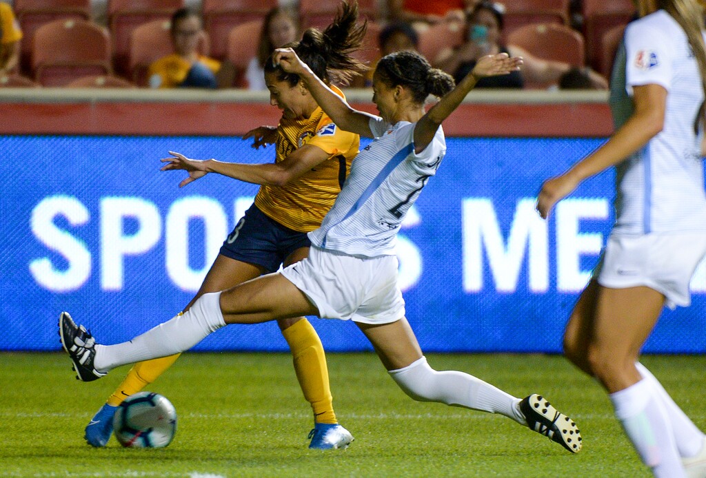 (Leah Hogsten  |  The Salt Lake Tribune) Sky Blue FC forward McKenzie Meehan (2) stops Utah Royals FC forward Christen Press (23) as the Utah Royals FC host Sky Blue FC, August 7, 2019 at Rio Tinto Stadium. 