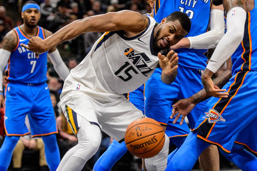 (Trent Nelson | The Salt Lake Tribune)  Utah Jazz forward Derrick Favors (15) is stripped of the ball as the Utah Jazz host the Oklahoma City Thunder, NBA basketball in Salt Lake City, Saturday December 23, 2017.