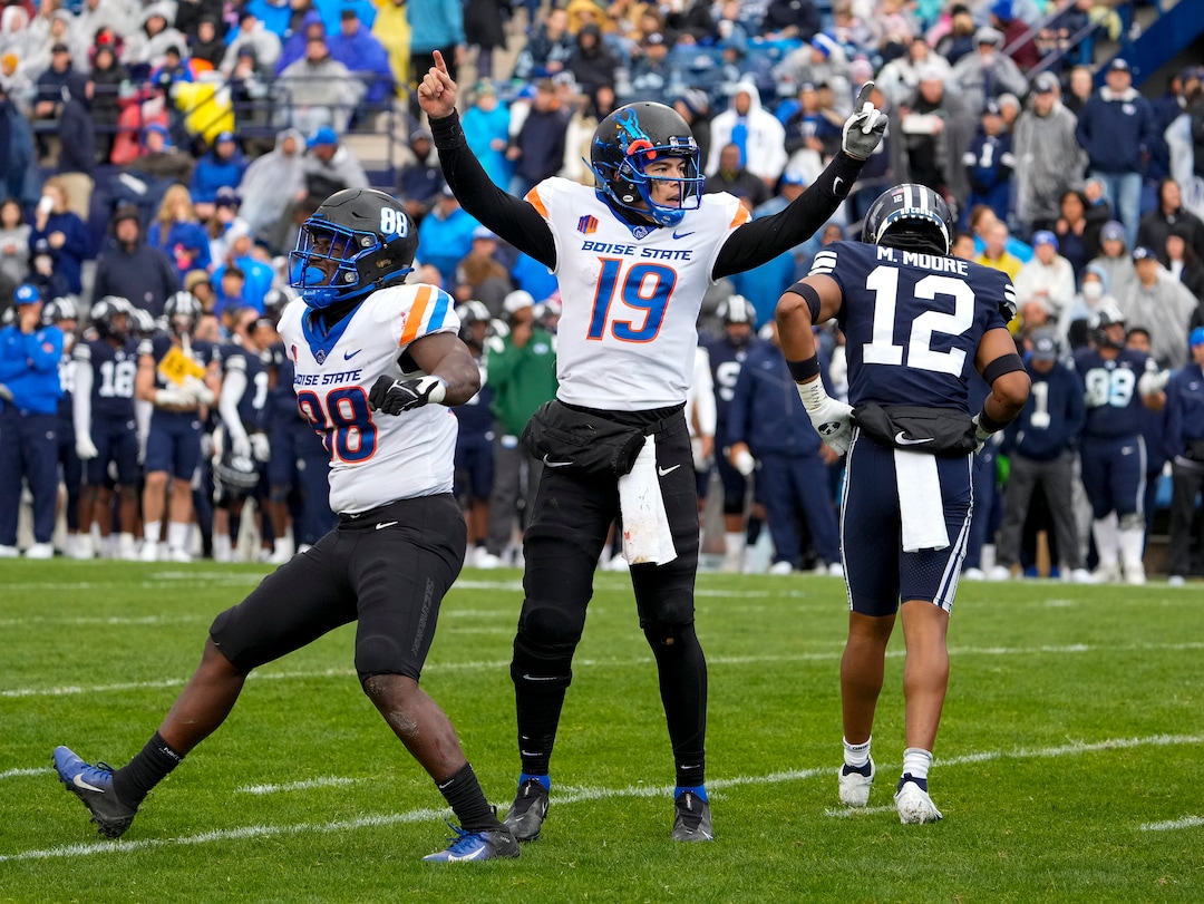 (Leah Hogsten | The Salt Lake Tribune) Boise State Broncos quarterback Hank Bachmeier (19) celebrates the team's second touchdown in the first half as No. 10 Brigham Young University hosts Boise State at LaVell Edwards Stadium, Oct. 9, 2021.