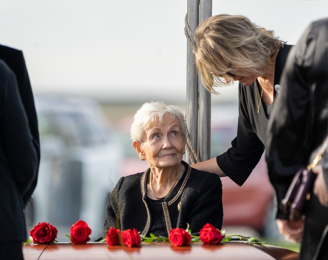 (Rick Egan | The Salt Lake Tribune)  Elaine Hatch is confronted by a a loved one, at the grave side of her husband, Orrin Hatch, at the Newton Cemetery, on Friday, May 6, 2022.