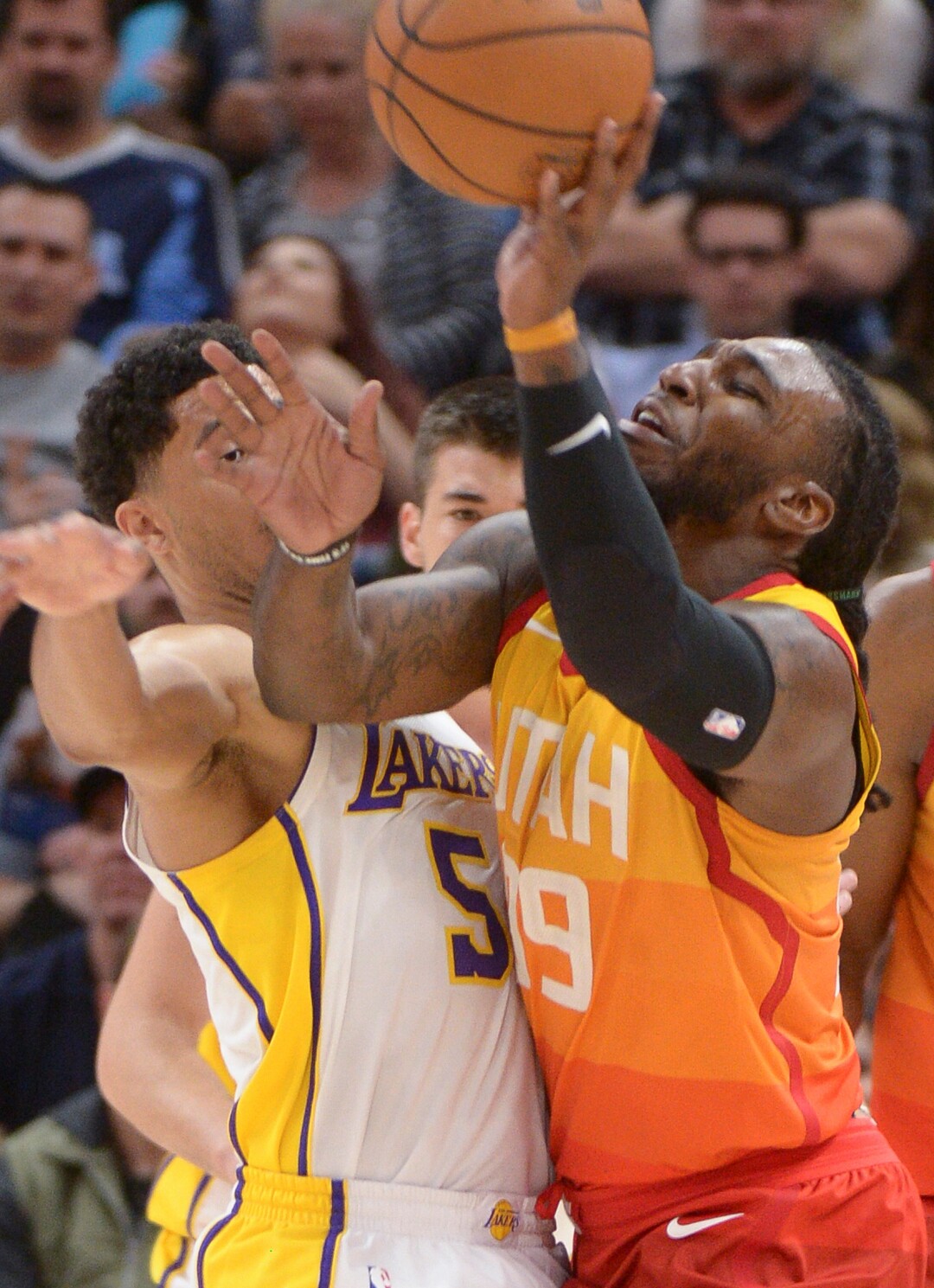 (Leah Hogsten  |  The Salt Lake Tribune)  Utah Jazz forward Jae Crowder (99) is pressured by Los Angeles Lakers guard Josh Hart (5).  The Utah Jazz defeated the Los Angeles Lakers 117-110 at Vivint Smart Home Arena Tuesday, April 3, 2018