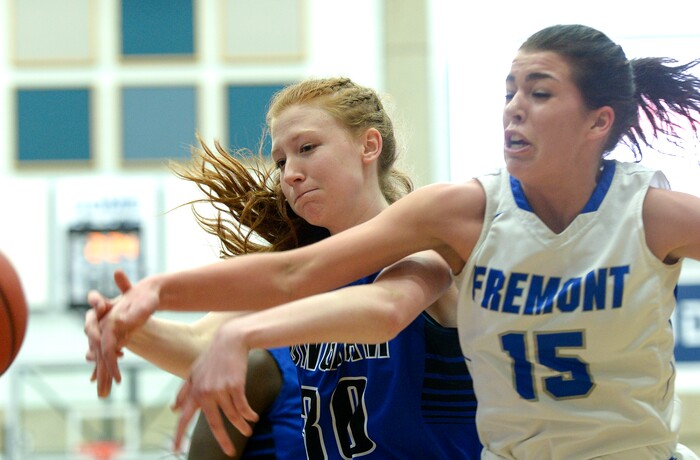 (Leah Hogsten  |  The Salt Lake Tribune) Bingham's Samantha Holman (30) and Fremont's Mazzie Melaney (15) fight for the rebound. Bingham faces Fremont in the championship game of the 6A High School Girls' Basketball Tournament at SLCC in Taylorsville,Saturday, Feb. 24, 2018. 