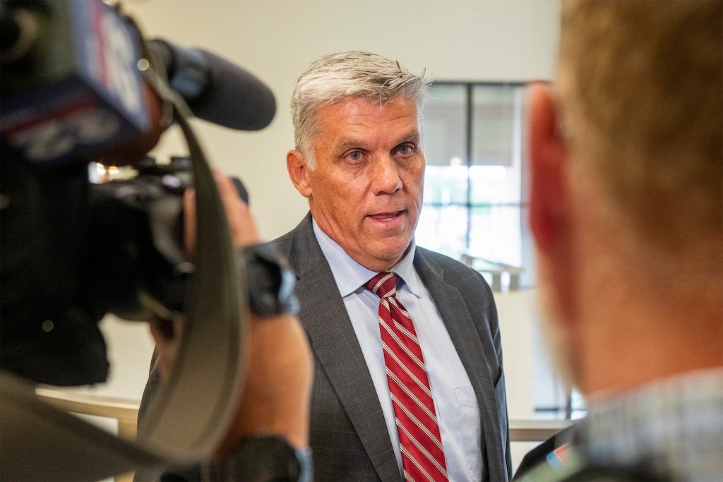 (Rick Egan | The Salt Lake Tribune)  Phil Lyman talks to the media after a court hearing in West Jordan on Thursday, July 18, 2024, in an effort to obtain signatures Gov. Spencer Cox used to qualify for the 2024 primary election. Lyman has filed a new lawsuit trying to remove Cox from office and upend Utah's election laws.