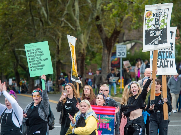 (Rick Egan  |  The Salt Lake Tribune)      Hundreds of students from around the state chant and sing as they march up State Street to the Utah State Capitol Building, demanding action on the climate crisis. Friday, Sept. 20, 2019.