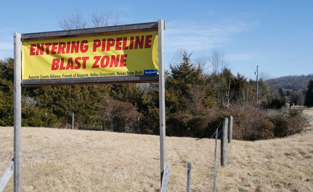 (Steve Helber | AP file photo)  A sign along a highway to protests the route of the Atlantic Coast Pipeline in Deerfield, Va., on Feb. 8, 2018. The developers of the Atlantic Coast Pipeline announced Sunday, July 5, 2020, that they are canceling the multi-state natural gas project, citing delays and increasing cost uncertainty.