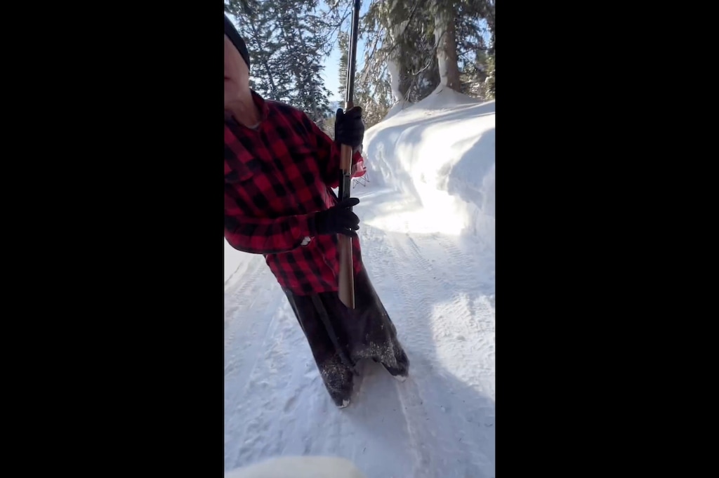 (Loren Richardson via Instagram) Keith Stebbings of the Town of Brighton is seen in this video screen grab from Feb. 24, 2024, holding a Winchester rifle while confronting snowboarder Loren Richardson of Clovis, Calif., about trespassing.