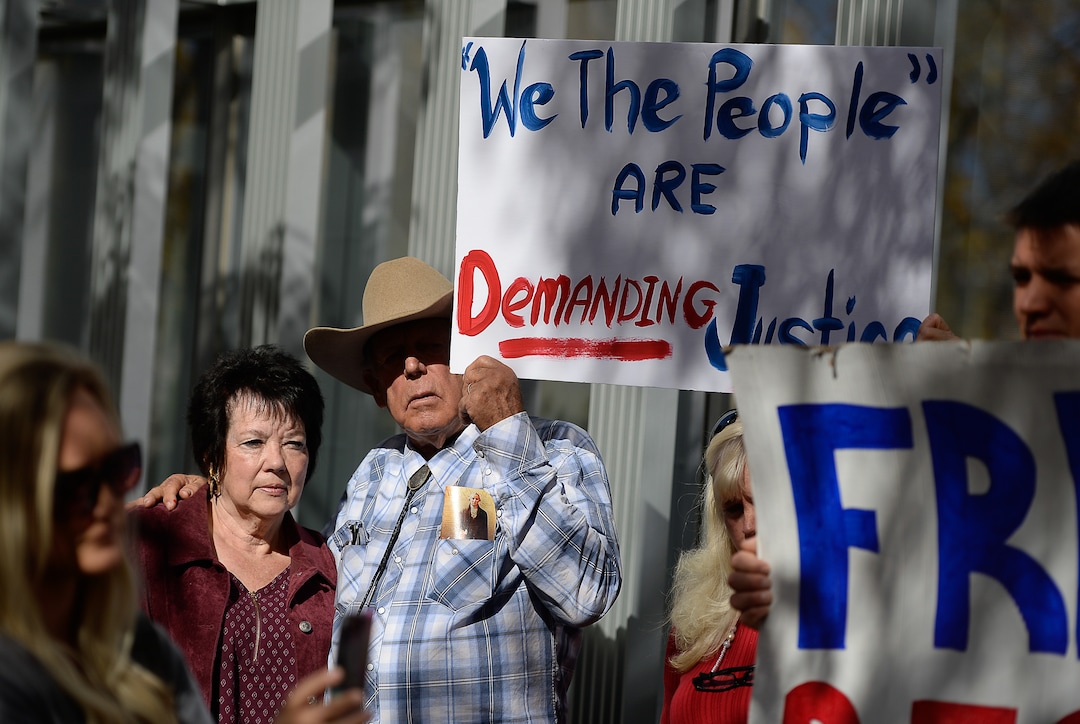 (Francisco Kjolseth  |  The Salt Lake Tribune)  Cliven and Carol Bundy, left, join other supporters of convicted fraudster Rick Koerber as they gather ahead of his court sentencing in Salt Lake City at the Federal Courthouse on Tuesday, Oct. 15, 2019, ending a nearly two decade white collar crime saga.