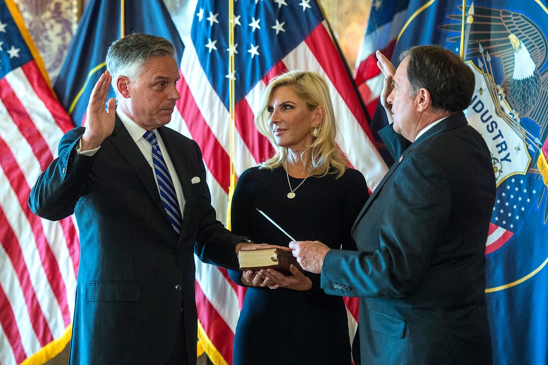 (Chris Detrick  |  The Salt Lake Tribune)  Gov. Gary R. Herbert swears in Jon M. Huntsman, Jr. as U.S. Ambassador to Russia during an Ambassadorial Swearing in Ceremony at the Utah Capitol Saturday, October 7, 2017. Mary Kaye Huntsman is in the middle.