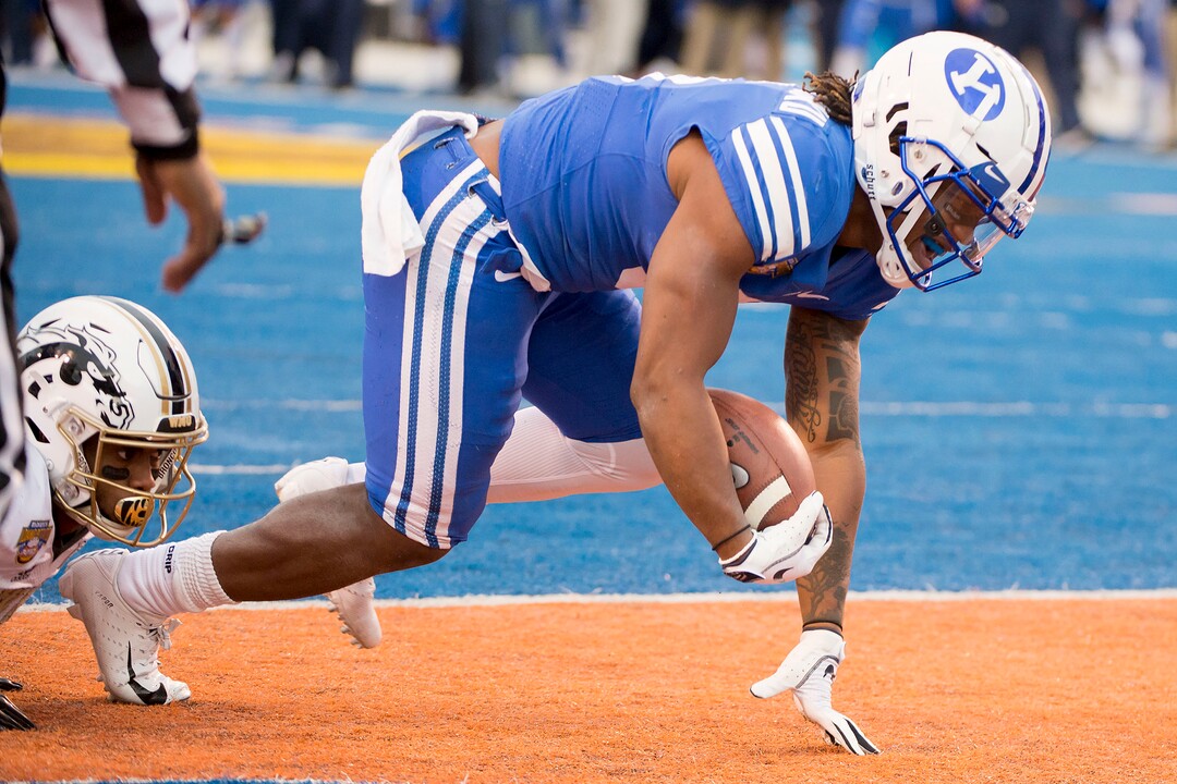 (Jeremy Harmon  |  The Salt Lake Tribune) Brigham Young Cougars defensive back Dayan Ghanwoloku (5) gets into the end zone for a touchdown as BYU faces the Western Michigan Broncos in the Famous Idaho Potato Bowl in Boise, Idaho, on Friday, Dec. 21, 2018.