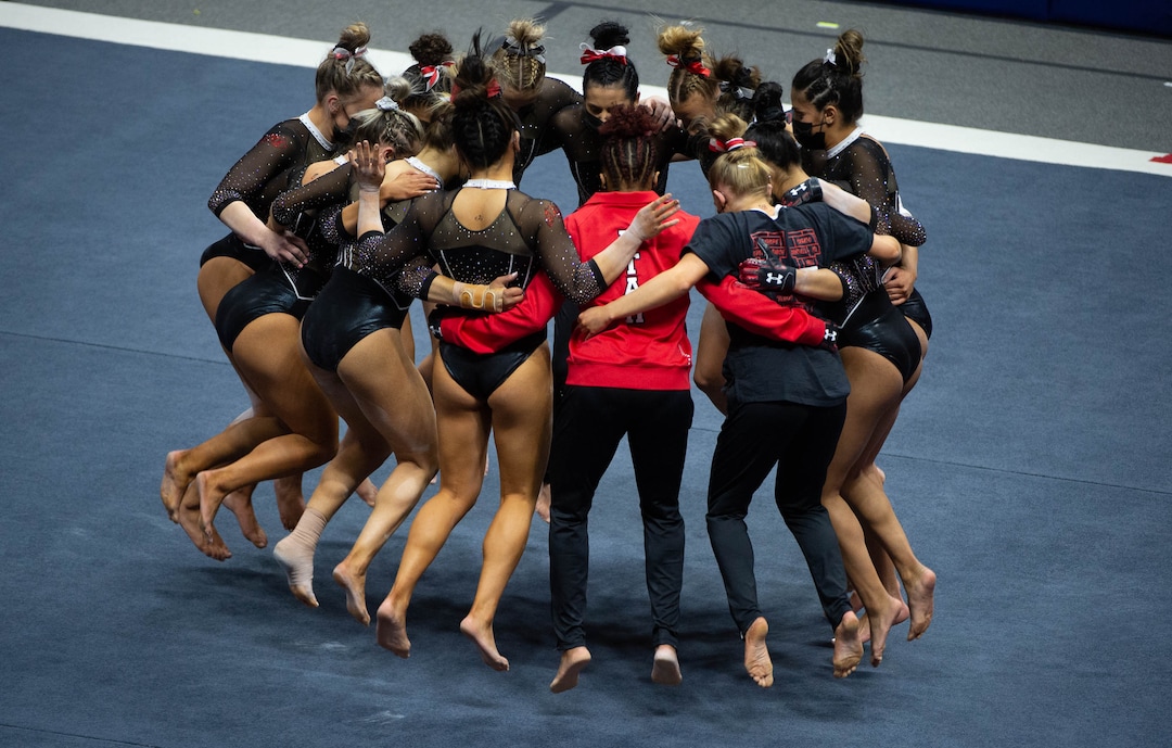 (Francisco Kjolseth  | The Salt Lake Tribune) The Utah gymnastics team gets psyched up for their floor routine in PAC-12 gymnastics action Utah vs UCLA, at the Huntsman Center on Friday, Feb. 19, 2021.