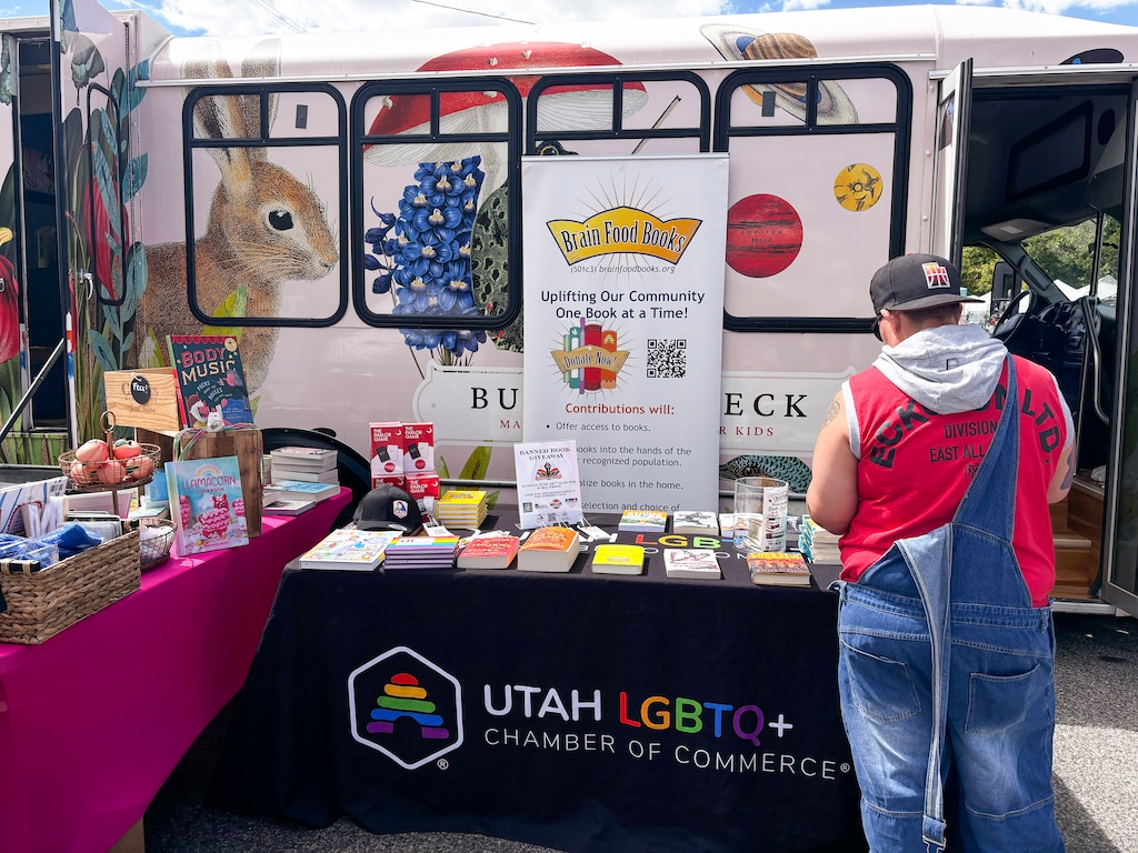 (Carmen Nesbitt | The Salt Lake Tribune) LGBTQ+ groups and local booksellers give away free banned books at SLC Pride on Sunday, June 28, 2026.