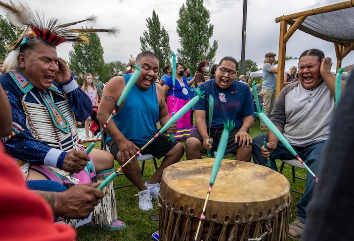 (Leah Hogsten | The Salt Lake Tribune The Sage Point drummers from Ft. Hall, ID perform the opening song on Friday evening of the 41st Annual Paiute Indian Tribe of Utah Restoration Gathering, Aug. 13, 2021 in Cedar City, Utah.