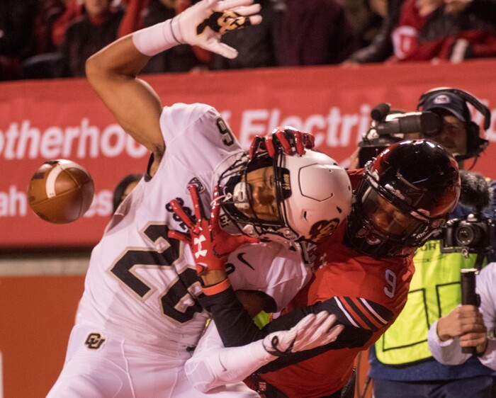 (Rick Egan  |  The Salt Lake Tribune) Colorado Buffaloes defensive back Isaiah Oliver (26) breaks up a pass intended for Utah Utes wide receiver Darren Carrington II (9), in PAC-12 football action Utah Utes vs. Colorado Buffaloes at Rice-Eccles stadium, Saturday, November 25, 2017.