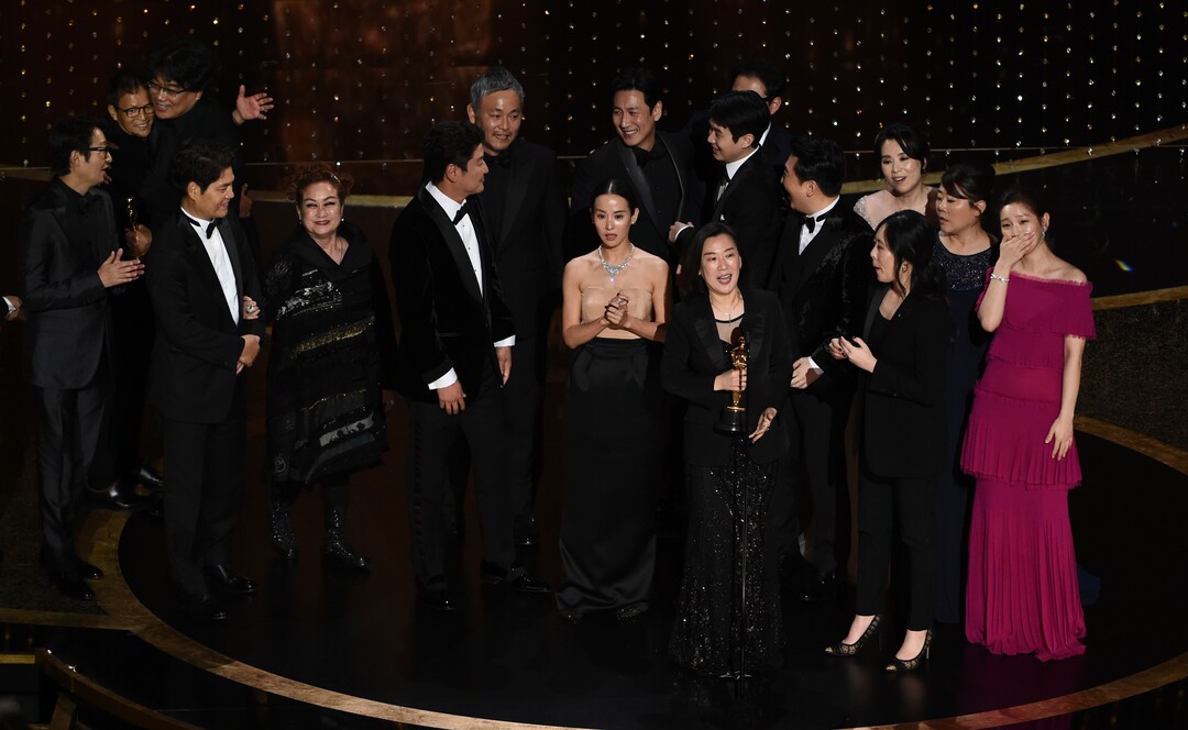 (Chris Pizzello | AP)  The cast and crew of "Parasite" accept the award for best picture at the Oscars on Sunday, Feb. 9, 2020, at the Dolby Theatre in Los Angeles.