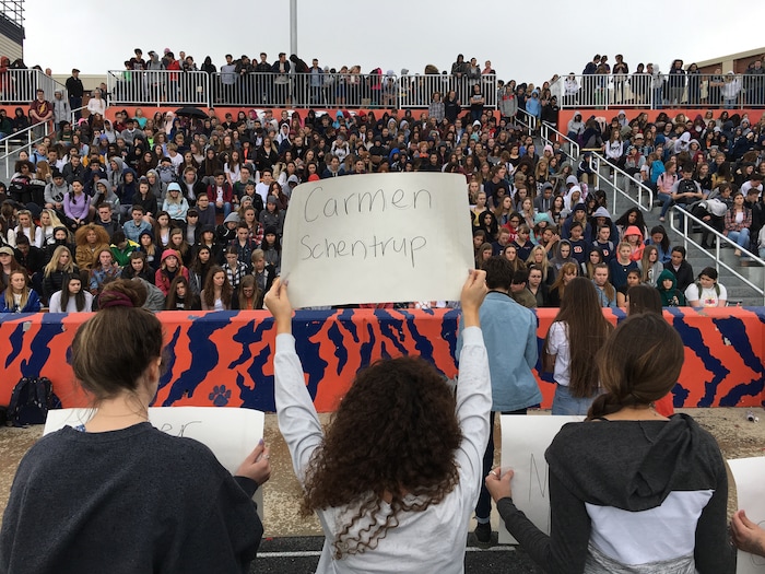 (Scott Sommerdorf  |  The Salt Lake Tribune) Students at Brighton High School in Cottonwood Heights hold cards with the names of those killed during a school shooting in  Parkland, Fla., as they participate in a nationwide demonstration for better gun safety laws on March 14, 2018.