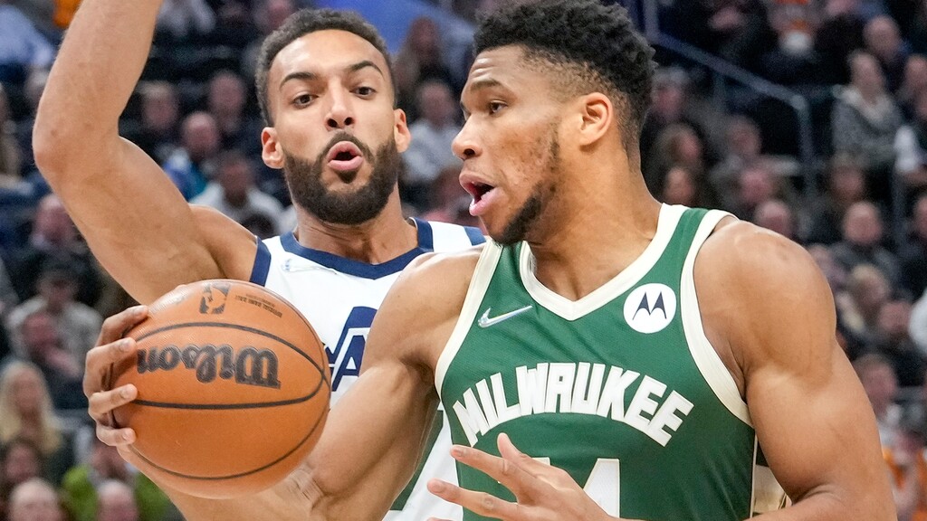 (Leah Hogsten | The Salt Lake Tribune) Utah Jazz center Rudy Gobert (27) pressures Milwaukee Bucks forward Giannis Antetokounmpo (34)as the Utah Jazz host the Milwaukee Bucks at Vivint Arena, Mar. 14, 2022.