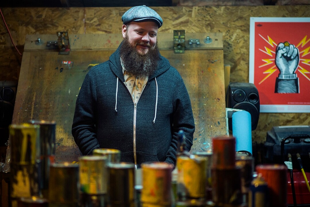 (Chris Detrick  |  The Salt Lake Tribune)  Artist Travis Bone poses for a portrait in his workshop in Midvale Tuesday, November 28, 2017.  