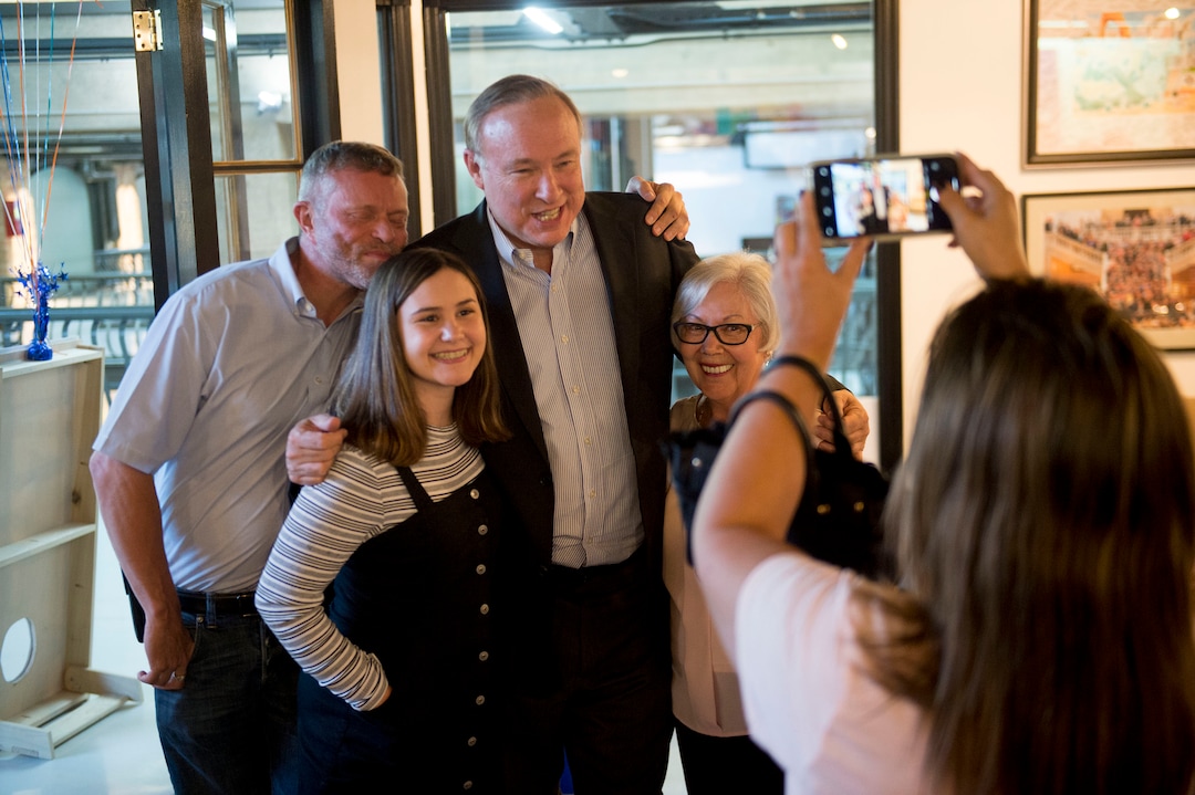 (Jeremy Harmon  |  The Salt Lake Tribune) Jim Dabakis poses for a photo with his husband Stephen Justesen, Myrissa Thurman, center, and Ojik Degeus during an election night party in Salt Lake City on Tuesday, August 13, 2019.