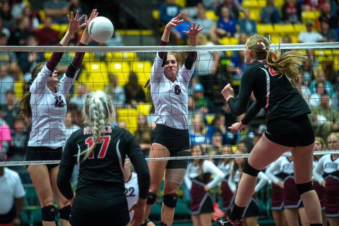 (Chris Detrick  |  The Salt Lake Tribune)  Morgan's Abbie Cox (12) and Morgan's Baylee Loertscher (6) go up to block North Sanpete's Madisyn Allred (20) during the the 3A volleyball state championships at the UCCU Center at Utah Valley University Thursday, October 26, 2017.  Morgan defeated North Sanpete 3-0.