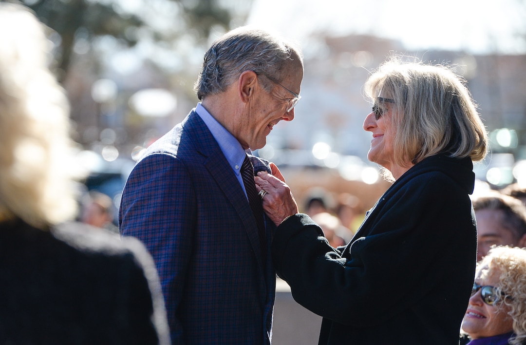 (Francisco Kjolseth  |  The Salt Lake Tribune) Daniel E. Dugan, receives a pin that looks like the key to the city by his wife Sarah, after being sworn in as District 6 Councilman at Salt Lake City Hall on Monday, Jan. 6, 2020.