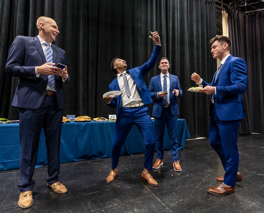 (Leah Hogsten | The Salt Lake Tribune) Brigham Young University basketball team head coach Mark Pope, left, shares a laugh with player Te'Jon Lucas, director of operations Bobby Jorodyski and player Alex Barcello at the BYU Broadcasting Center, Oct. 21, 2021.