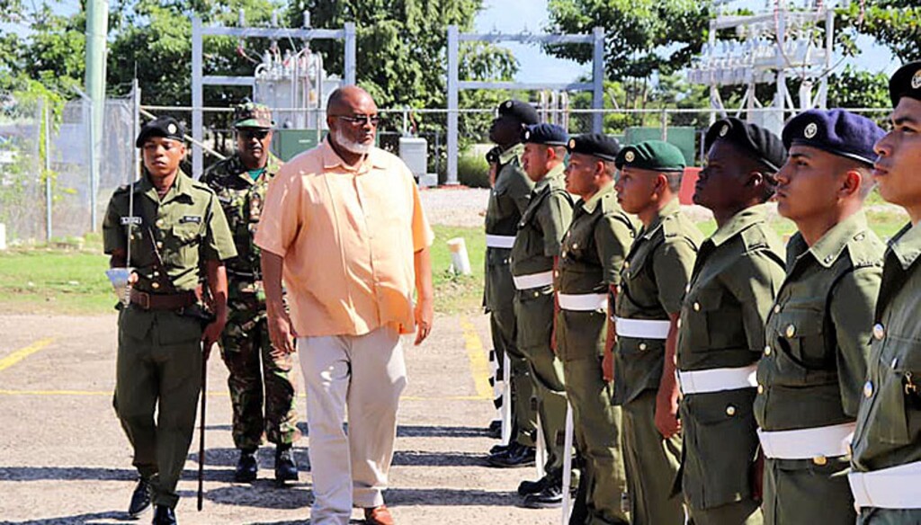 (Image via Belize Ministry of National Security) Belize Minister of National Security John B. Saldivar inspects security facilities Dec. 14, 2019.
