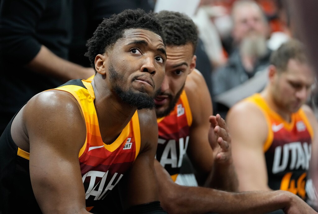 (Francisco Kjolseth | The Salt Lake Tribune) Utah Jazz guard Donovan Mitchell (45) listens to Utah Jazz center Rudy Gobert (27) during a time out during Game 3 of an NBA basketball first-round playoff series against the Dallas Mavericks, Thursday, April 21, 2022, in Salt Lake City.