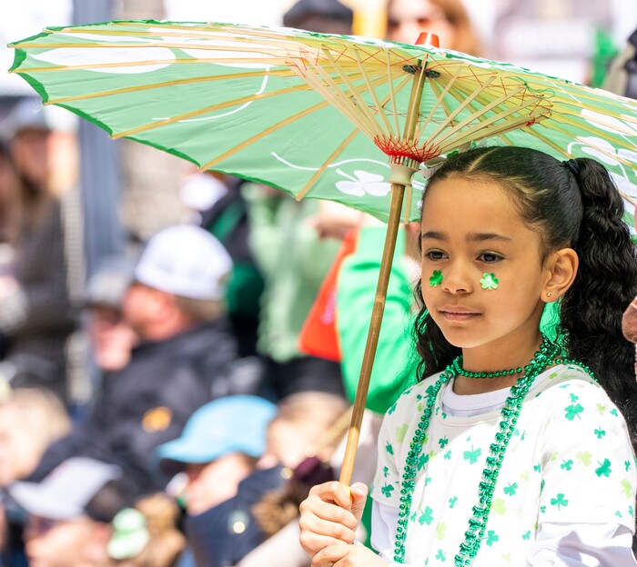 (Rick Egan | The Salt Lake Tribune) Sadie Galvas watches the Saint Patrick's Day Parade at the Gateway on Saturday, March 11, 2023.