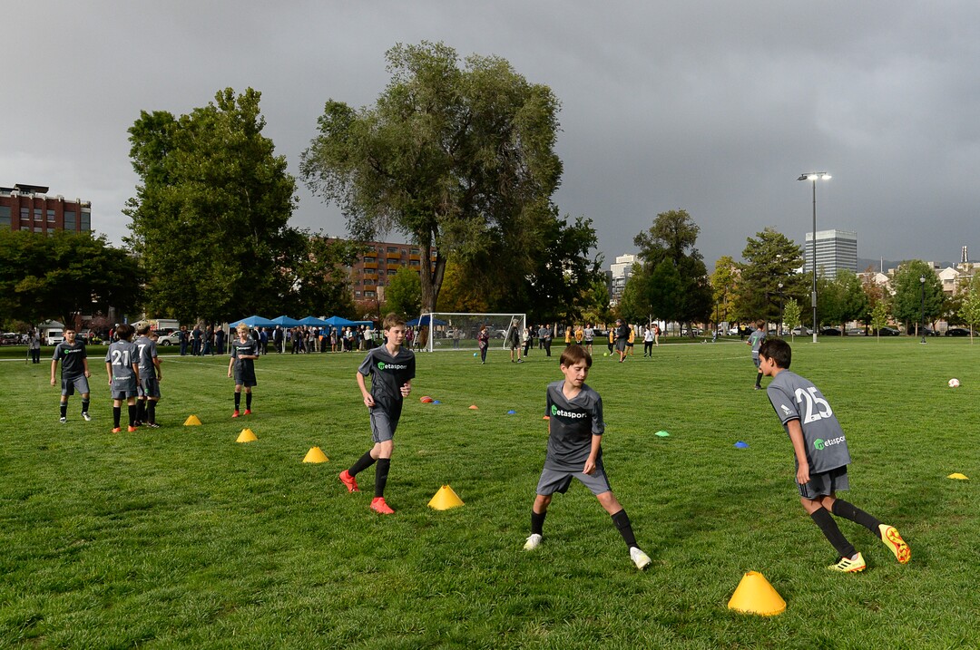 (Francisco Kjolseth  |  The Salt Lake Tribune)  Metasport FC youth soccer league warm up prior to a friendly game with the Blue Knights as part of a jubilee in celebration of the recently completed improvements at Pioneer Park, including a multi-purpose field on Tuesday, September 10, 2019.