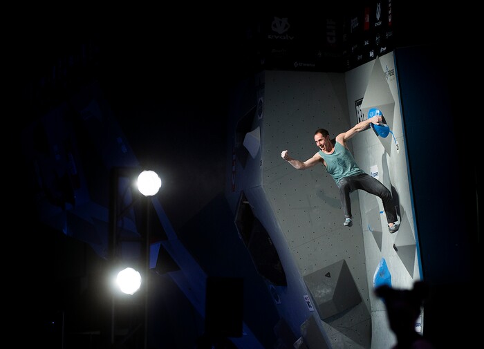 (Leah Hogsten  |  The Salt Lake Tribune) Carlo Taversi celebrates making it to the top of a problem during USA Climbing's Bouldering Open National Championships at the Salt Palace Convention Center, Saturday, February 3, 2018 in Salt Lake City, UT. 

. 