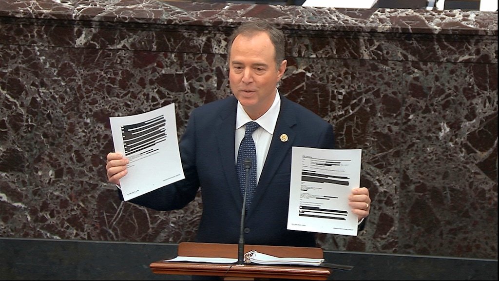 (Senate Television via AP) In this image from video, House impeachment manager Rep. Adam Schiff, D-Calif., holds redacted documents as he speaks during the impeachment trial against President Donald Trump in the Senate at the U.S. Capitol in Washington, Wednesday, Jan. 22, 2020.