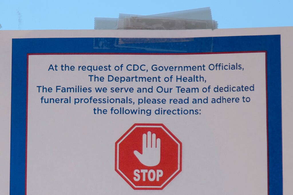 (Trent Nelson  |  The Salt Lake Tribune) A sign detailing COVID-19 procedures and precautions at Neptune Society in Salt Lake City on Monday, June 22, 2020.