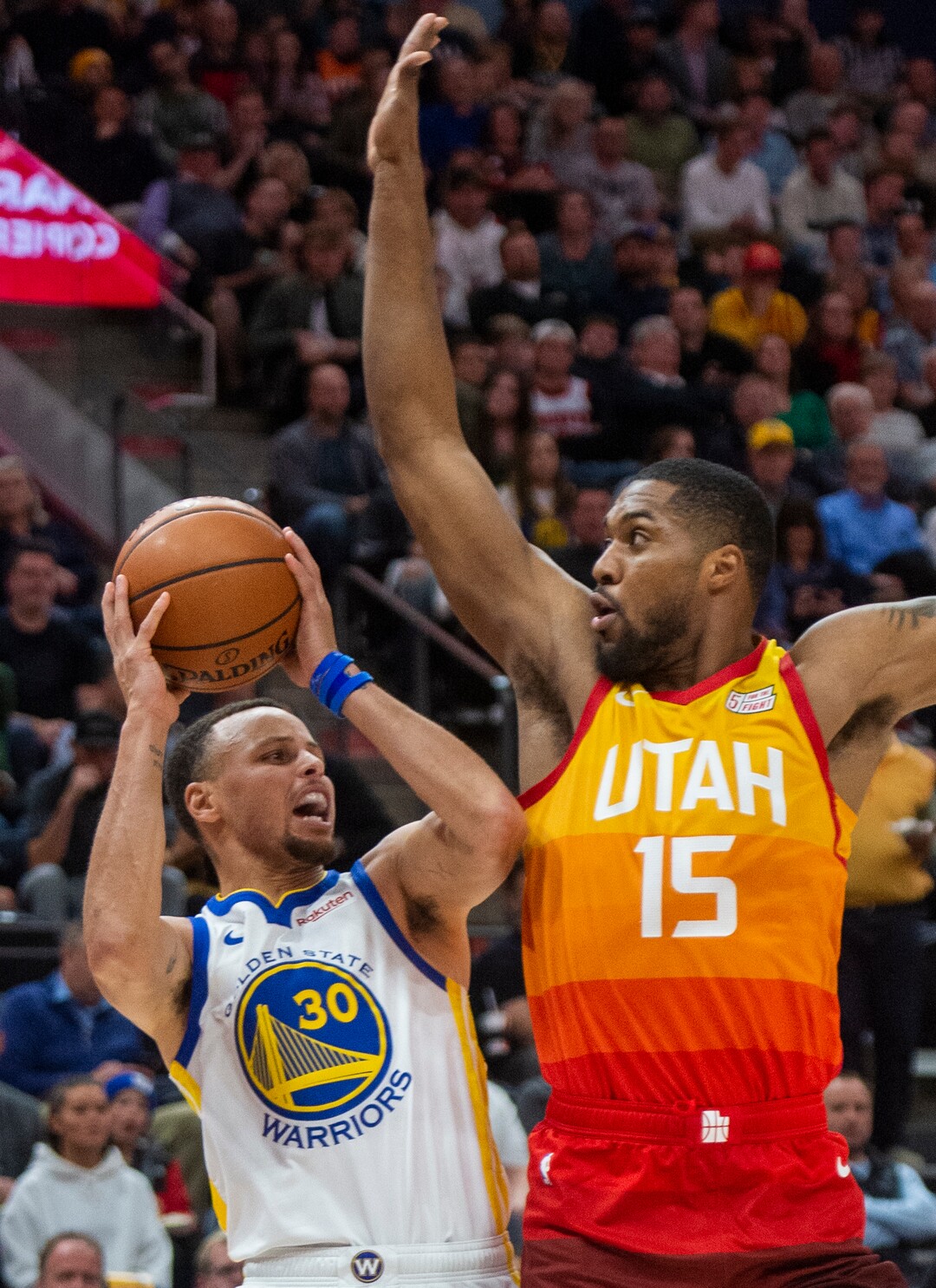 (Rick Egan  |  The Salt Lake Tribune)  Utah Golden State Warriors guard Stephen Curry (30) looks for a shot, as Utah Jazz forward Derrick Favors (15) defends, in NBA action between Utah Jazz and Golden State Warriors, in Salt Lake City, Wednesday, Dec. 19, 2018.