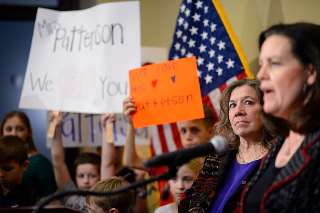 (Trent Nelson | The Salt Lake Tribune)  Valley View Elementary School teacher Moana Patterson listens as parent Kimberly Faddden speaks at a news conference by parents and students to show support for Patterson, in Salt Lake City on Monday March 11, 2019.  Fadden is the parent of a student at the school.