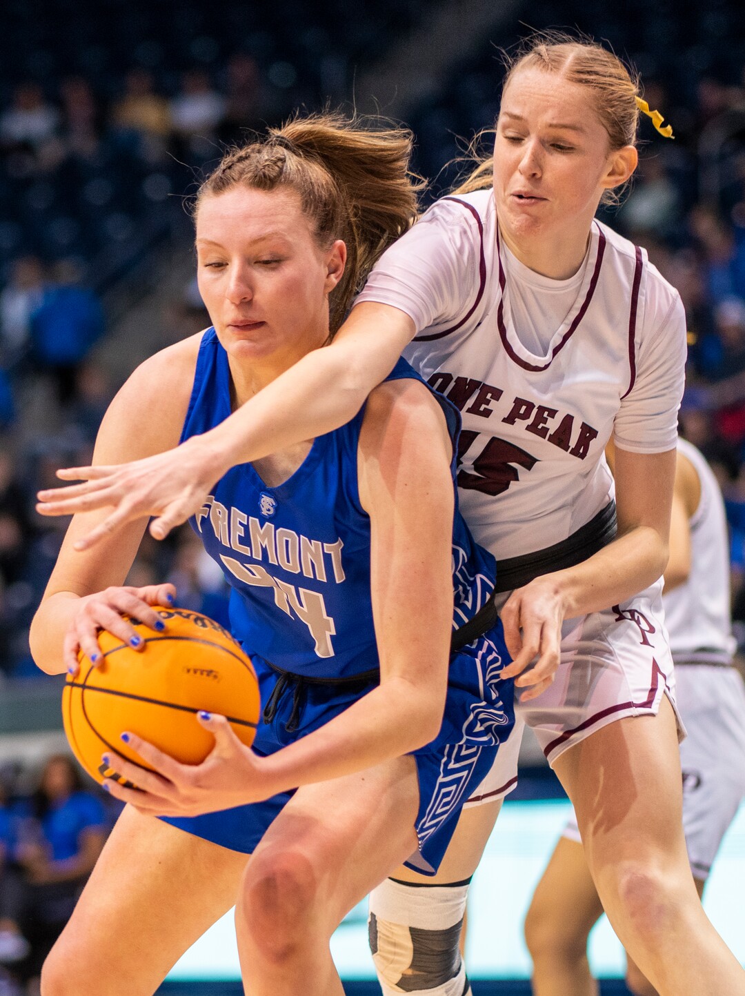 (Rick Egan | The Salt Lake Tribune) Fremont Center, Maggie Mendelson (44) is guarded by Lone Peak forward Kaylee Rich (45), in the 6A State Championship game between Fremont and Lone Peak, at the Marriott Center in Provo, on Saturday, March 5, 2022. 