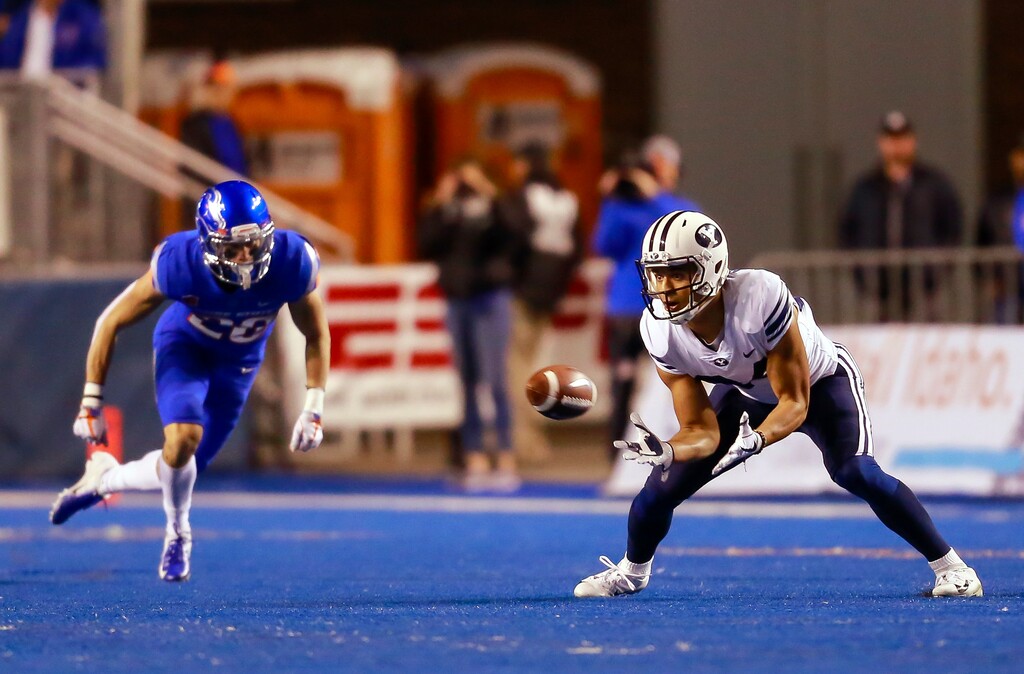 BYU wide receiver Neil Pau'u (84) makes a reception against Boise State during the first half of an NCAA college football game Saturday, Nov. 3, 2018, in Boise, Idaho. (AP Photo/Steve Conner)