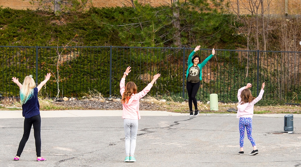 (Rick Egan  |  The Salt Lake Tribune)     Anju Thapaliya Sharma leads her neighbors in Midvale take part in a social distance Zumba session, Tuesday, March 24, 2020.