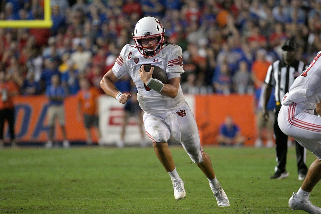 (Phelan M. Ebenhack | AP) Utah quarterback Cameron Rising (7) runs for yardage during the second half of an NCAA college football game against Florida, Saturday, Sept. 3, 2022, in Gainesville, Fla.