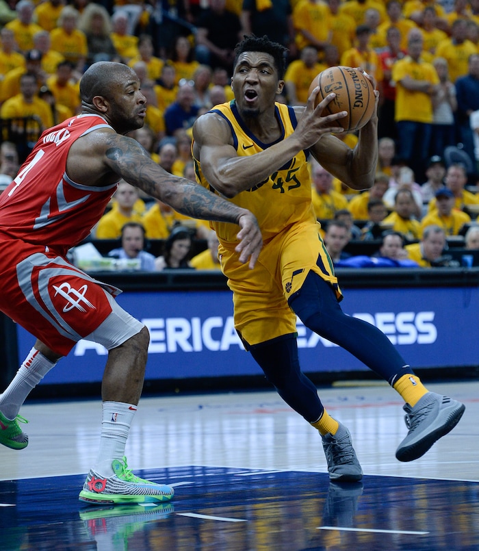 (Francisco Kjolseth | The Salt Lake Tribune) Utah Jazz guard Donovan Mitchell (45) drives the ball past the Houston Rockets in Game 4 of the NBA playoffs at the Vivint Smart Home Arena Sunday, May 6, 2018 in Salt Lake City.